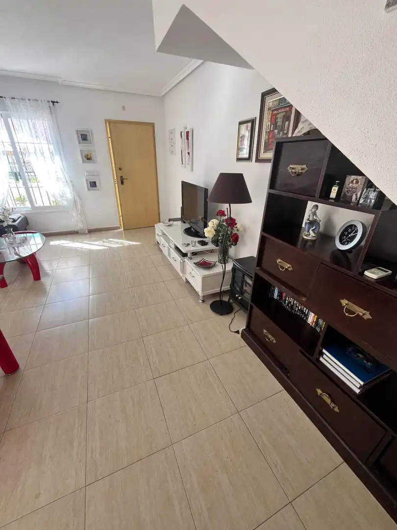 Sala de estar de Casa adosada en venta en Pulpí con Aire acondicionado, Jardín privado y Terraza