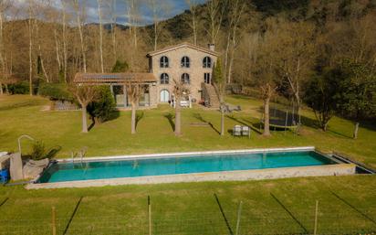 Jardí de Finca rústica en venda en Sant Joan Les Fonts amb Aire condicionat i Piscina