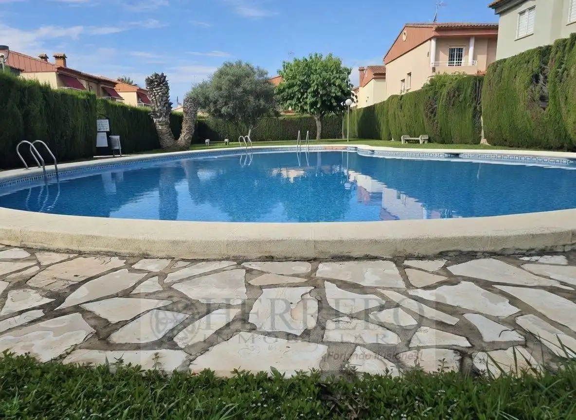 Piscina de Casa adosada en venta en Gandia con Aire acondicionado, Calefacción y Jardín privado