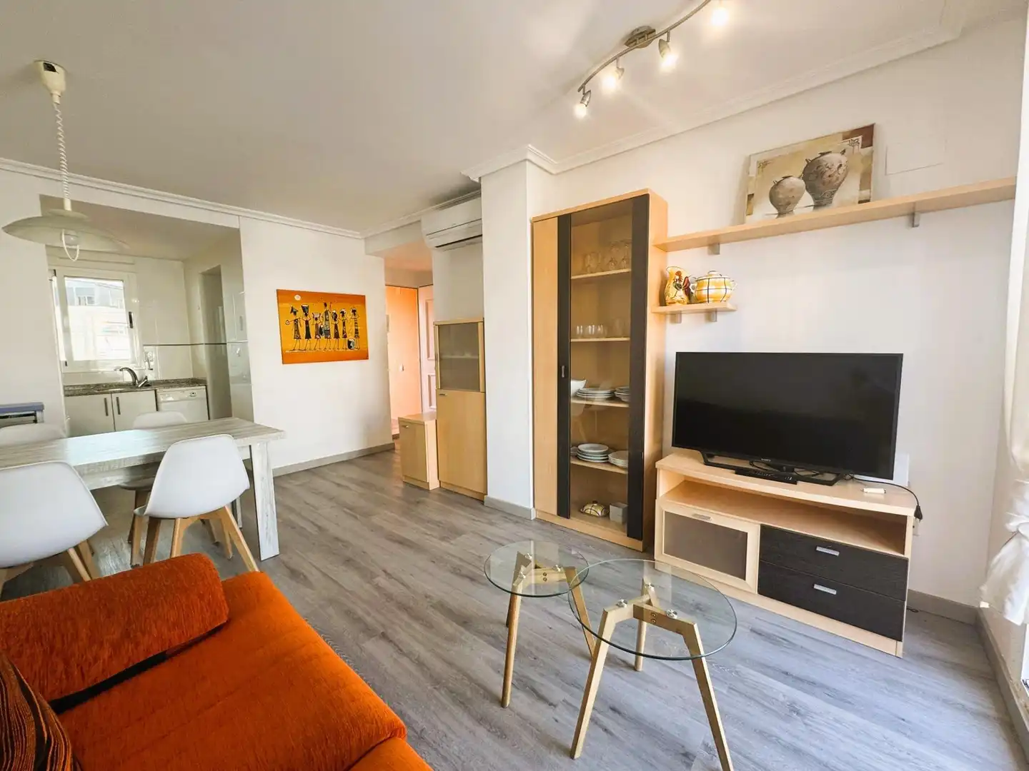 Sala d'estar de Apartament en venda en Dénia amb Aire condicionat, Jardí privat i Terrassa