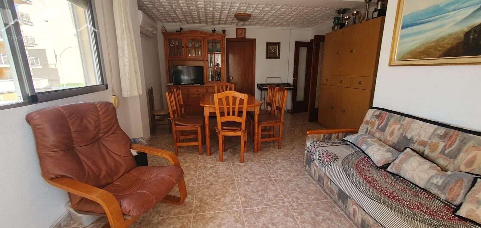 Sala d'estar de Apartament en venda en Daimús amb Aire condicionat, Jardí privat i Terrassa