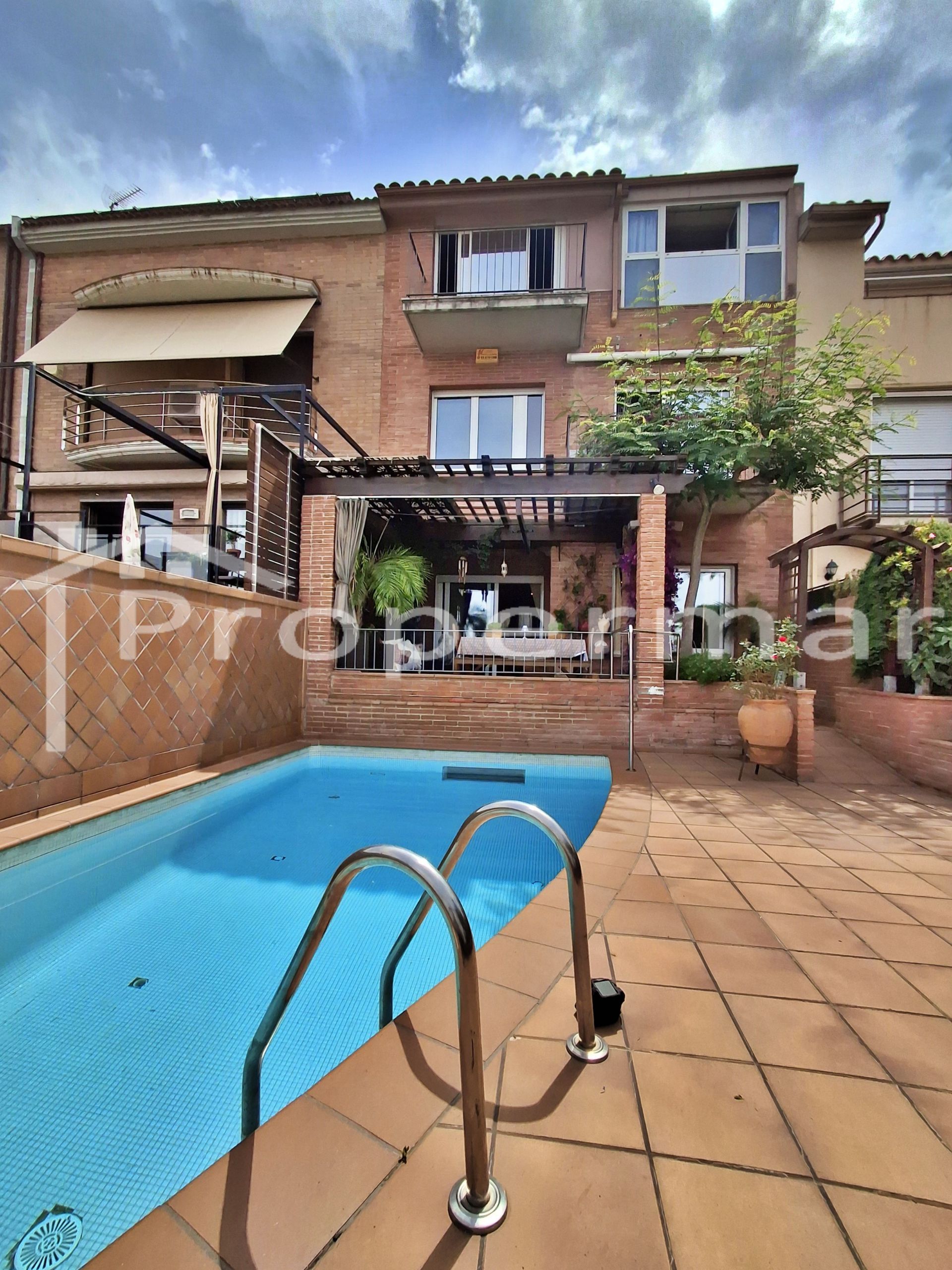 Swimming pool of Single-family semi-detached for sale in Granollers  with Air Conditioner, Heating and Private garden