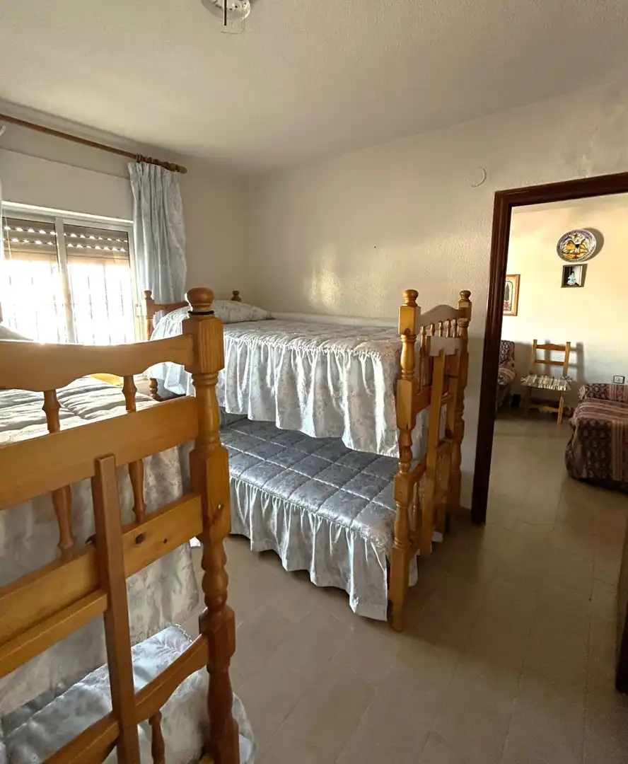 Dormitori de Casa o xalet en venda en Almonte amb Calefacció, Moblat i Piscina comunitària