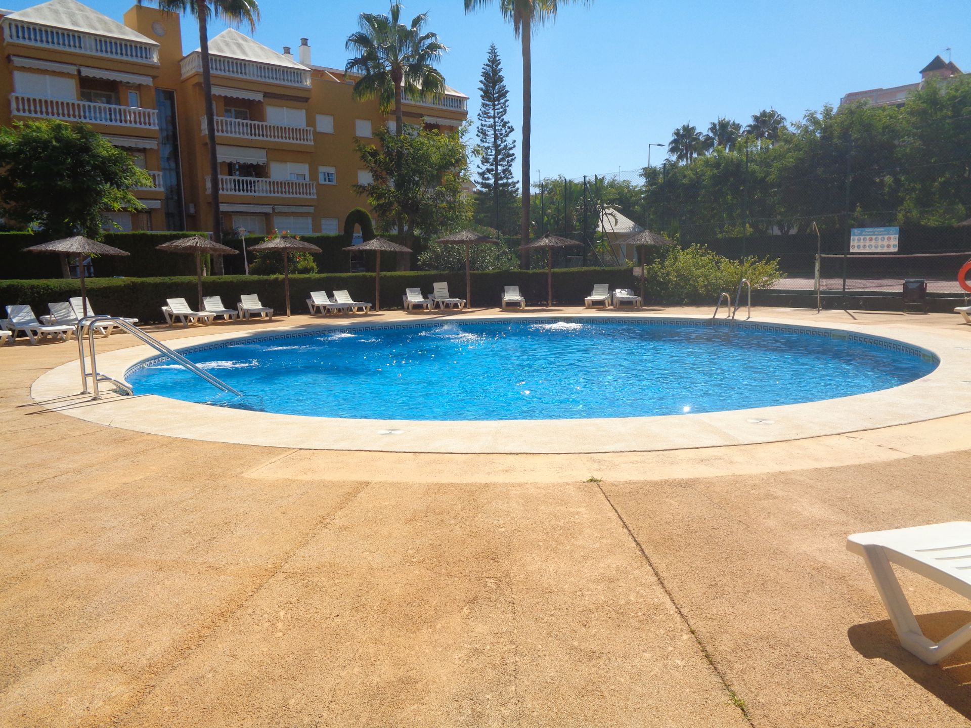 Swimming pool of Apartment for sale in Islantilla  with Air Conditioner, Terrace and Swimming Pool