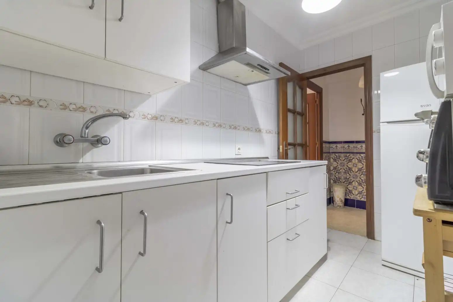 Cuina de Pis de lloguer en Sevilla amb Aire condicionat, Terrassa i Moblat