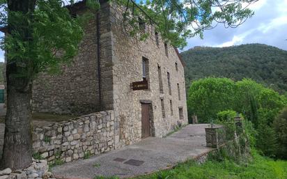 Vista exterior de Finca rústica en venda en Sant Joan Les Fonts amb Aire condicionat, Calefacció i Jardí privat