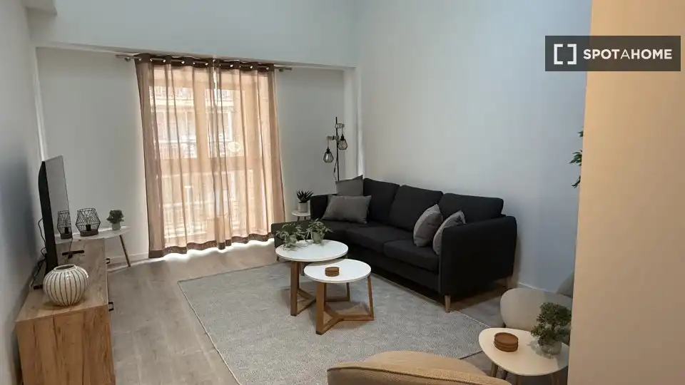 Sala d'estar de Apartament per a compartir en Málaga amb Aire condicionat, Terrassa i Moblat