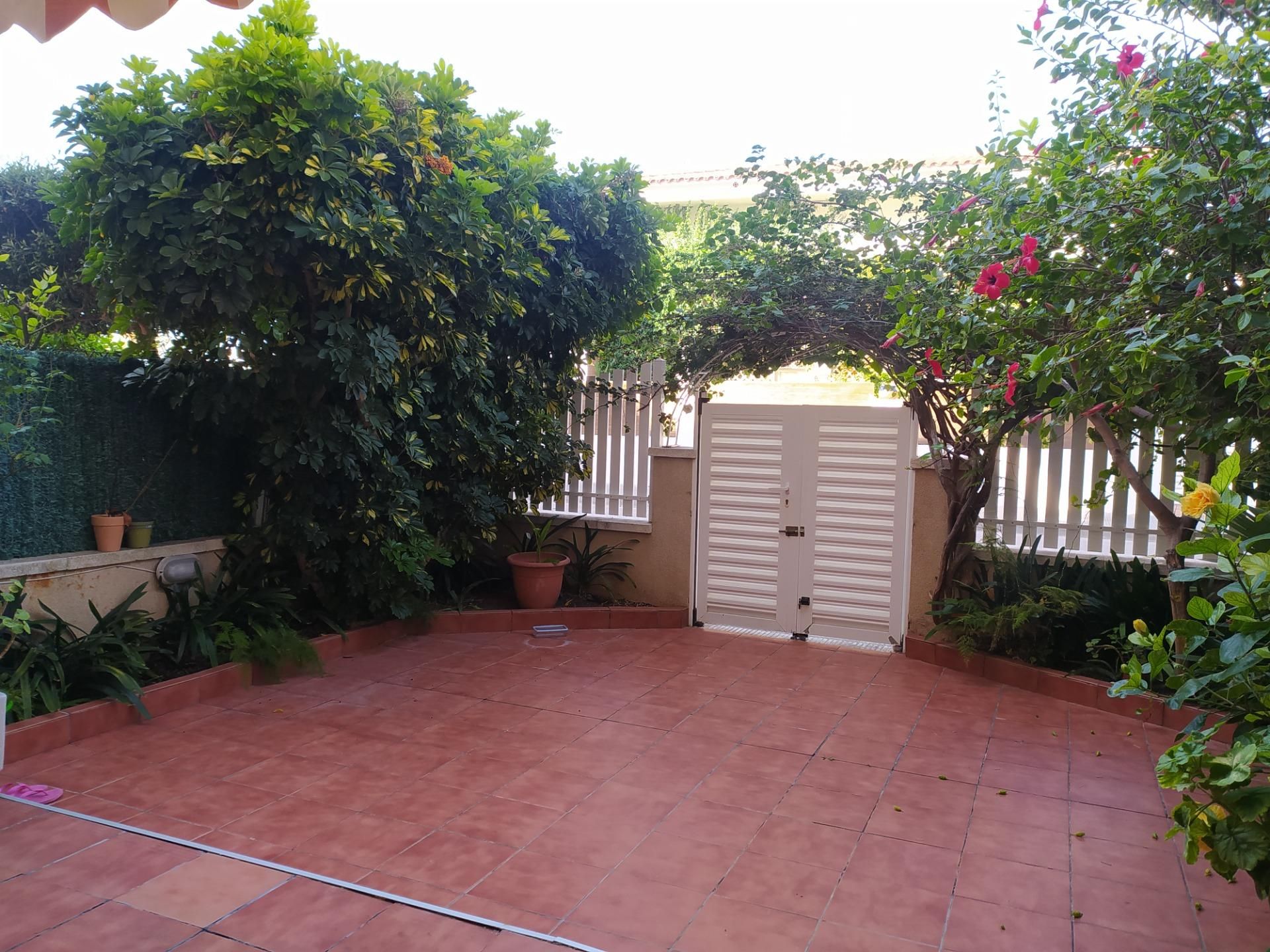 Garden of Planta baja for sale in Cunit  with Air Conditioner, Private garden and Terrace