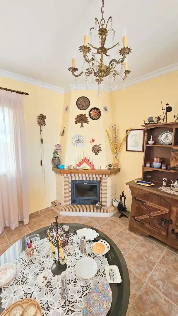 Sala d'estar de Casa adosada en venda en Vélez-Málaga amb Terrassa, Traster i Moblat