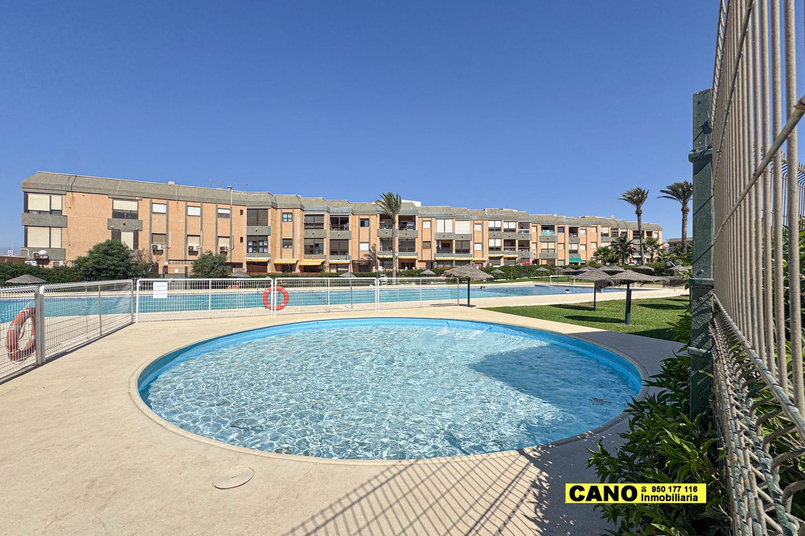 Swimming pool of Flat for sale in  Almería Capital  with Air Conditioner, Heating and Storage room