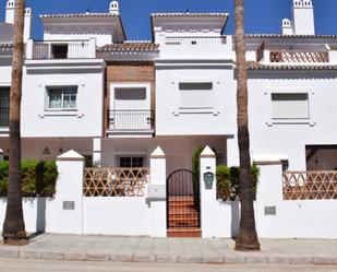 Exterior view of Single-family semi-detached for sale in Alhaurín de la Torre  with Air Conditioner, Heating and Private garden