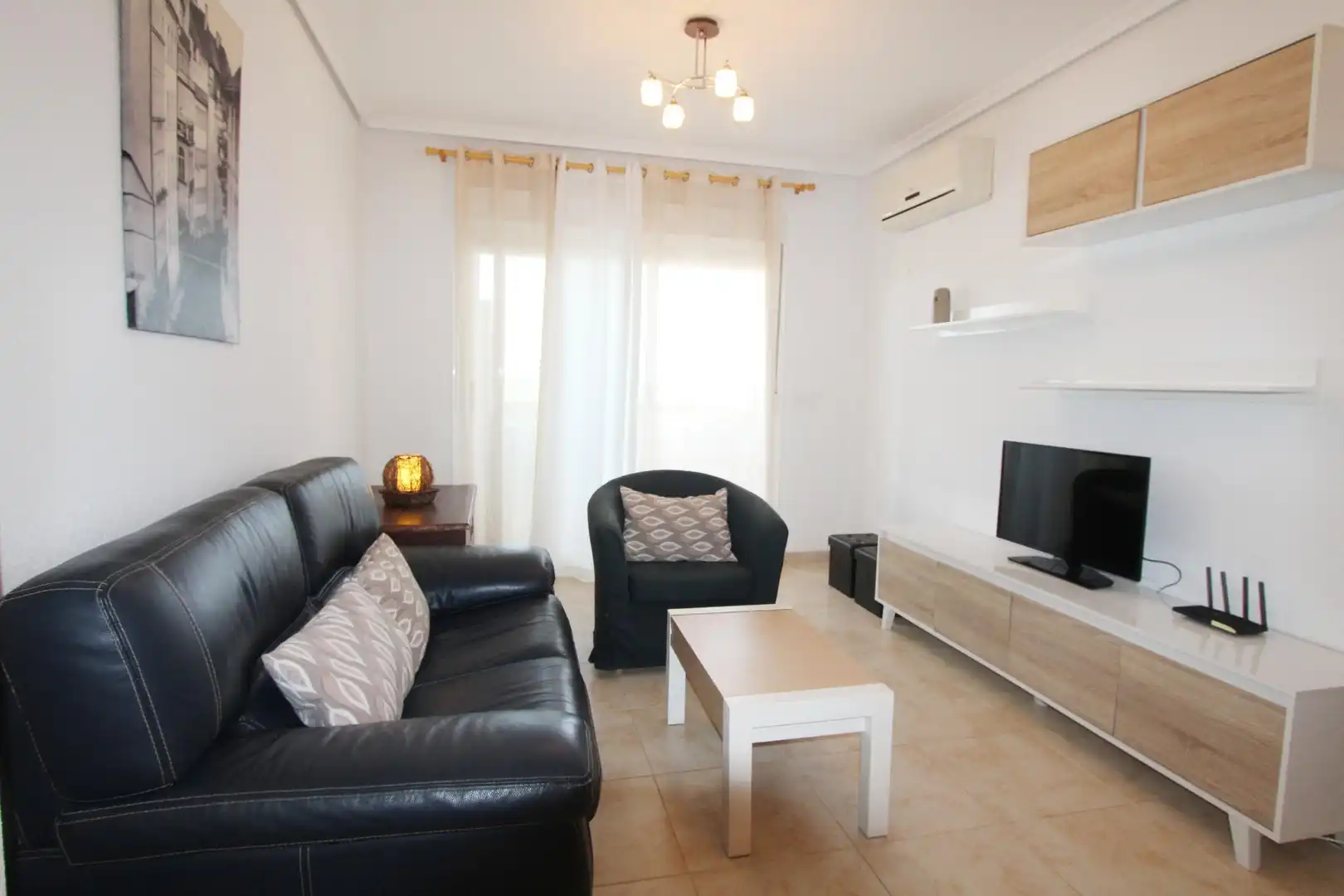 Sala d'estar de Apartament de lloguer en Cabanes amb Piscina comunitària