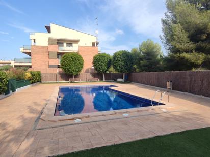 Swimming pool of Duplex for sale in Roda de Berà  with Air Conditioner and Terrace