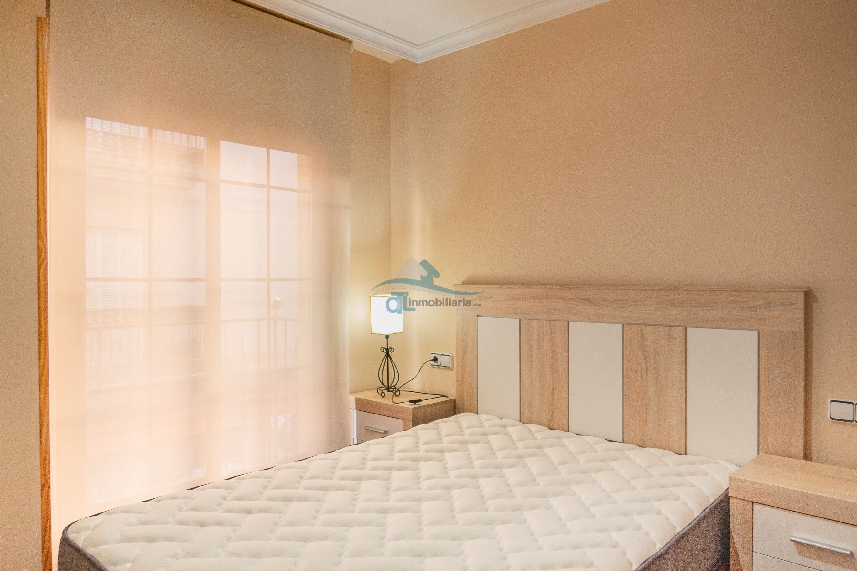 Dormitori de Apartament de lloguer en Linares amb Aire condicionat, Moblat i Forn