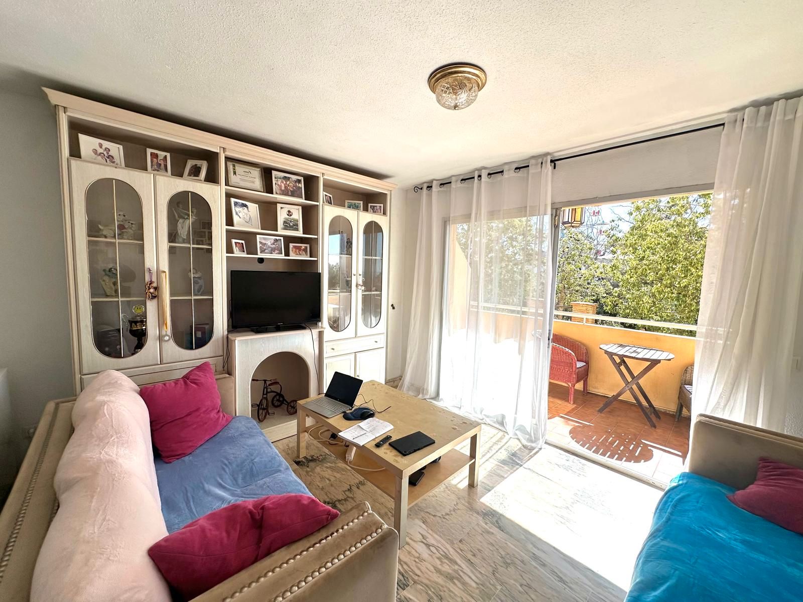 Living room of Flat for sale in Benalmádena  with Terrace, Storage room and Furnished