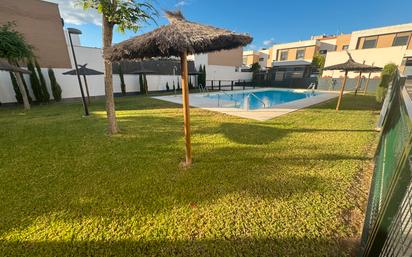 Swimming pool of Single-family semi-detached for sale in Dos Hermanas  with Air Conditioner, Heating and Parquet flooring