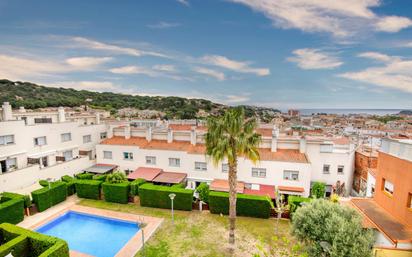 Exterior view of Single-family semi-detached for sale in Sant Feliu de Guíxols  with Heating, Terrace and Swimming Pool