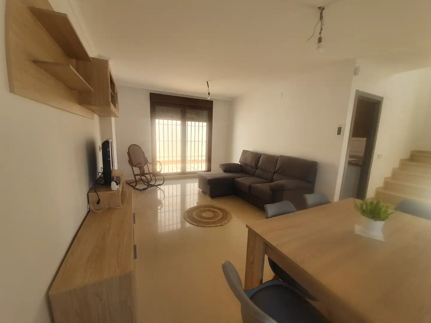 Sala d'estar de Casa adosada en venda en Guadix amb Terrassa, Traster i Moblat
