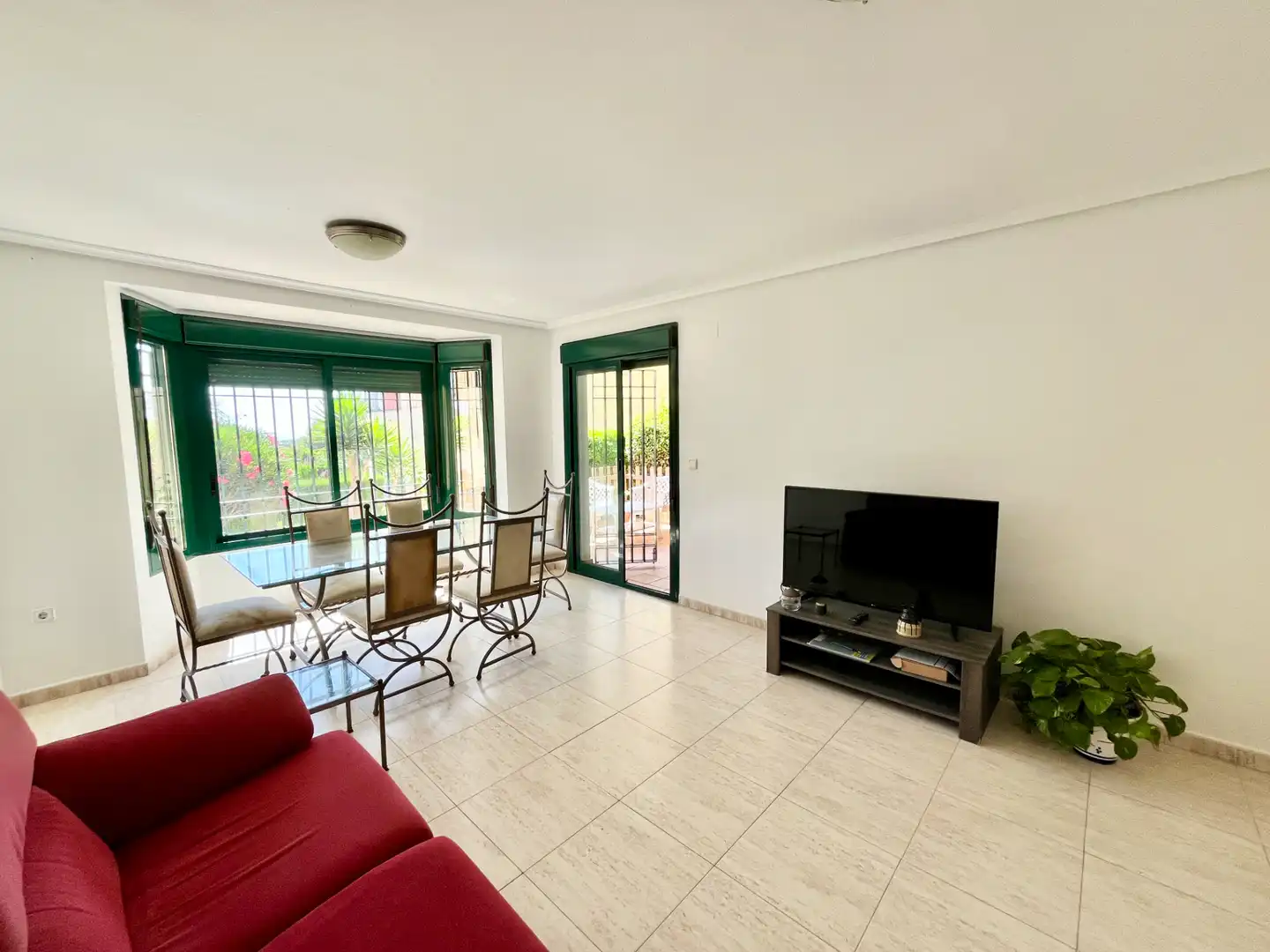 Sala d'estar de Apartament en venda en Orihuela amb Aire condicionat, Jardí privat i Terrassa