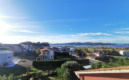 Vista exterior de Casa adosada en venda en Sanxenxo amb Calefacció i Moblat