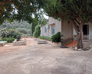 Jardí de Finca rústica de lloguer en Benidoleig amb Aire condicionat, Terrassa i Piscina