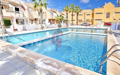 Piscina de Casa adosada en venda en Guardamar del Segura amb Aire condicionat, Calefacció i Terrassa