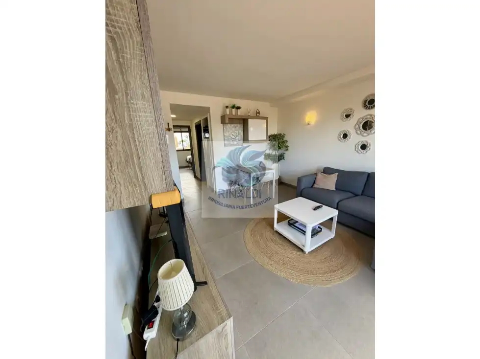 Sala de estar de Apartamento en venta en La Oliva con Terraza, Piscina y Amueblado