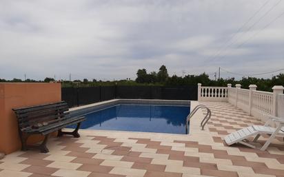 Swimming pool of House or chalet for sale in Benicull de Xúquer  with Air Conditioner, Terrace and Swimming Pool