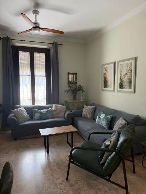Sala de estar de Piso para compartir en Córdoba con Aire acondicionado, Calefacción y Amueblado