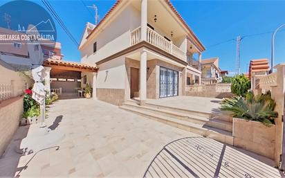 Exterior view of Single-family semi-detached for sale in Águilas  with Air Conditioner, Heating and Private garden