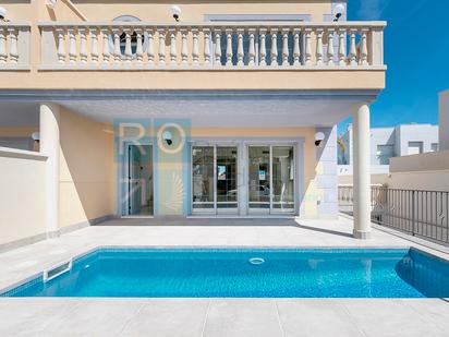 Swimming pool of Single-family semi-detached for sale in Cambrils  with Air Conditioner, Terrace and Swimming Pool