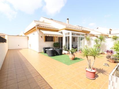 Exterior view of Single-family semi-detached for sale in Pilar de la Horadada  with Terrace, Storage room and Furnished