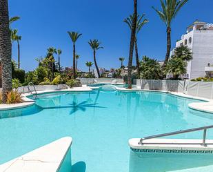 Swimming pool of Flat for sale in Torremolinos  with Air Conditioner, Terrace and Balcony