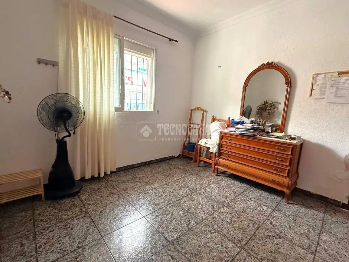 Dormitori de Casa adosada en venda en Málaga amb Jardí privat