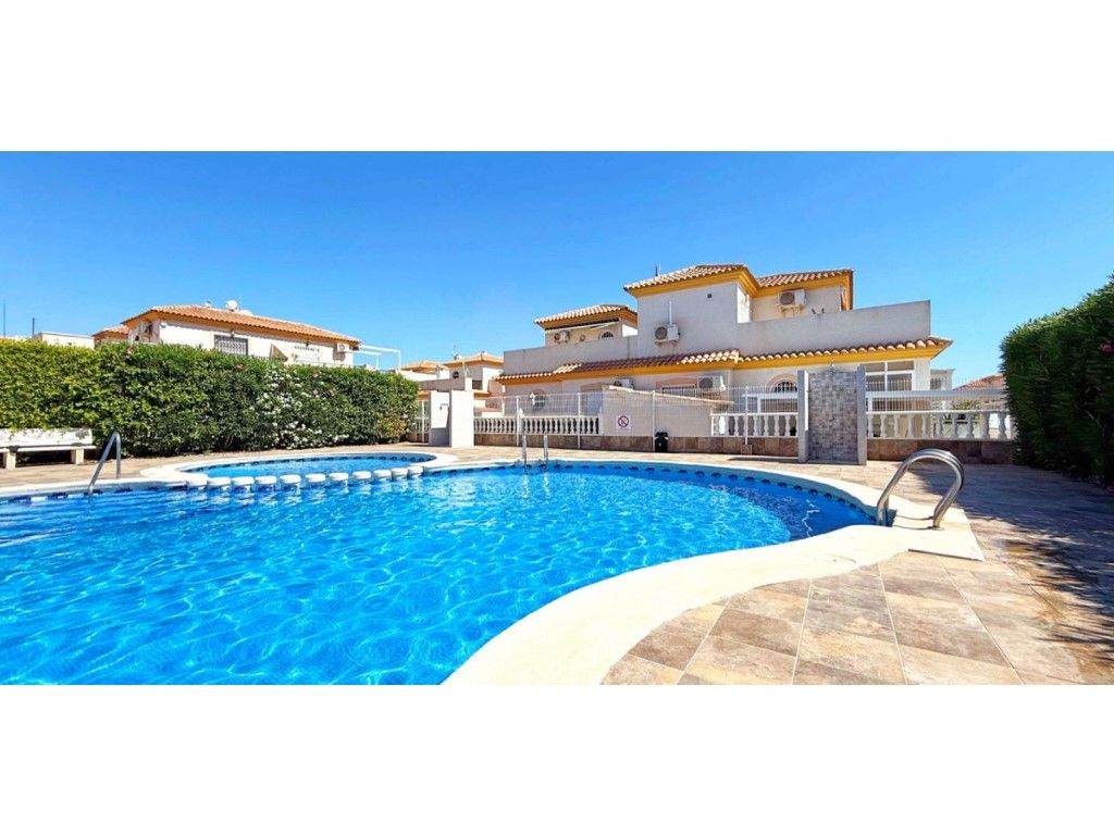 Swimming pool of Single-family semi-detached for sale in Orihuela  with Air Conditioner, Terrace and Storage room