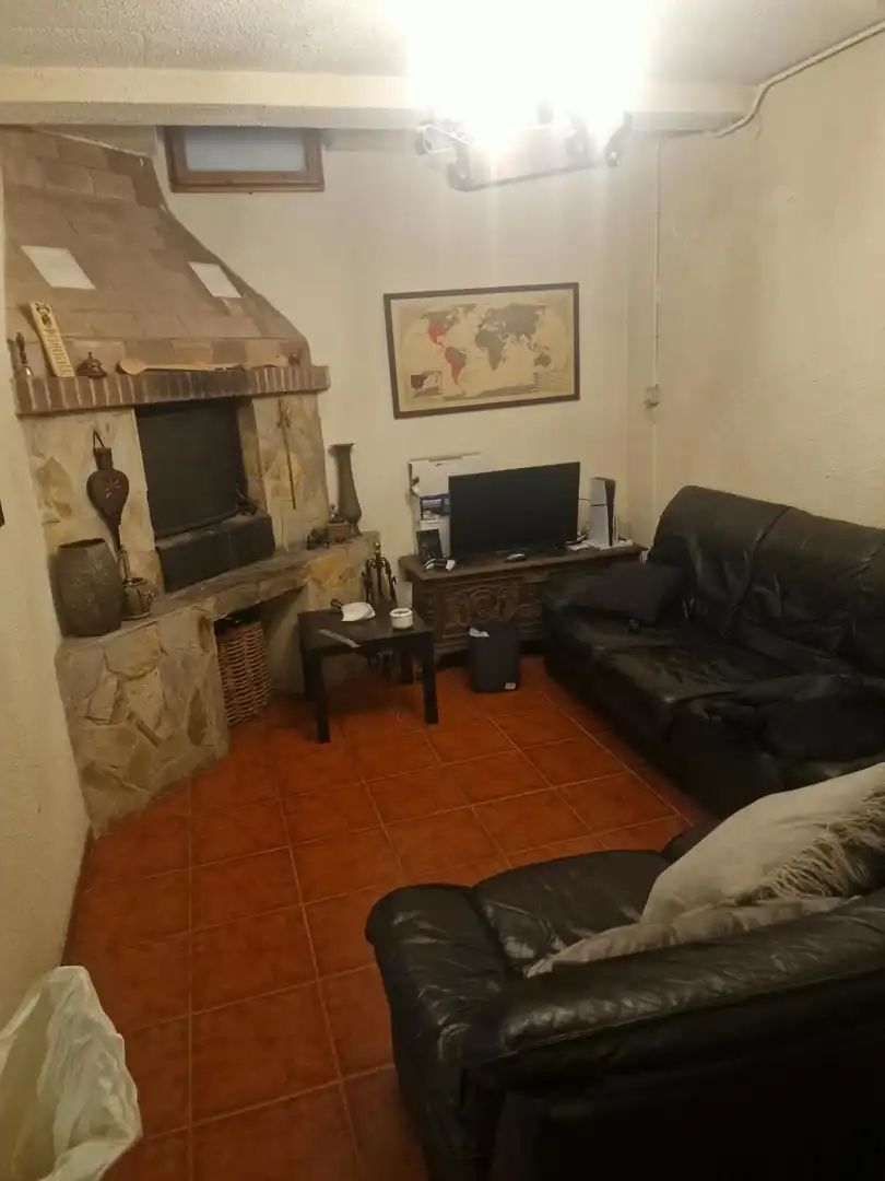 Sala d'estar de Casa adosada en venda en Zaragoza amb Terrassa i Piscina