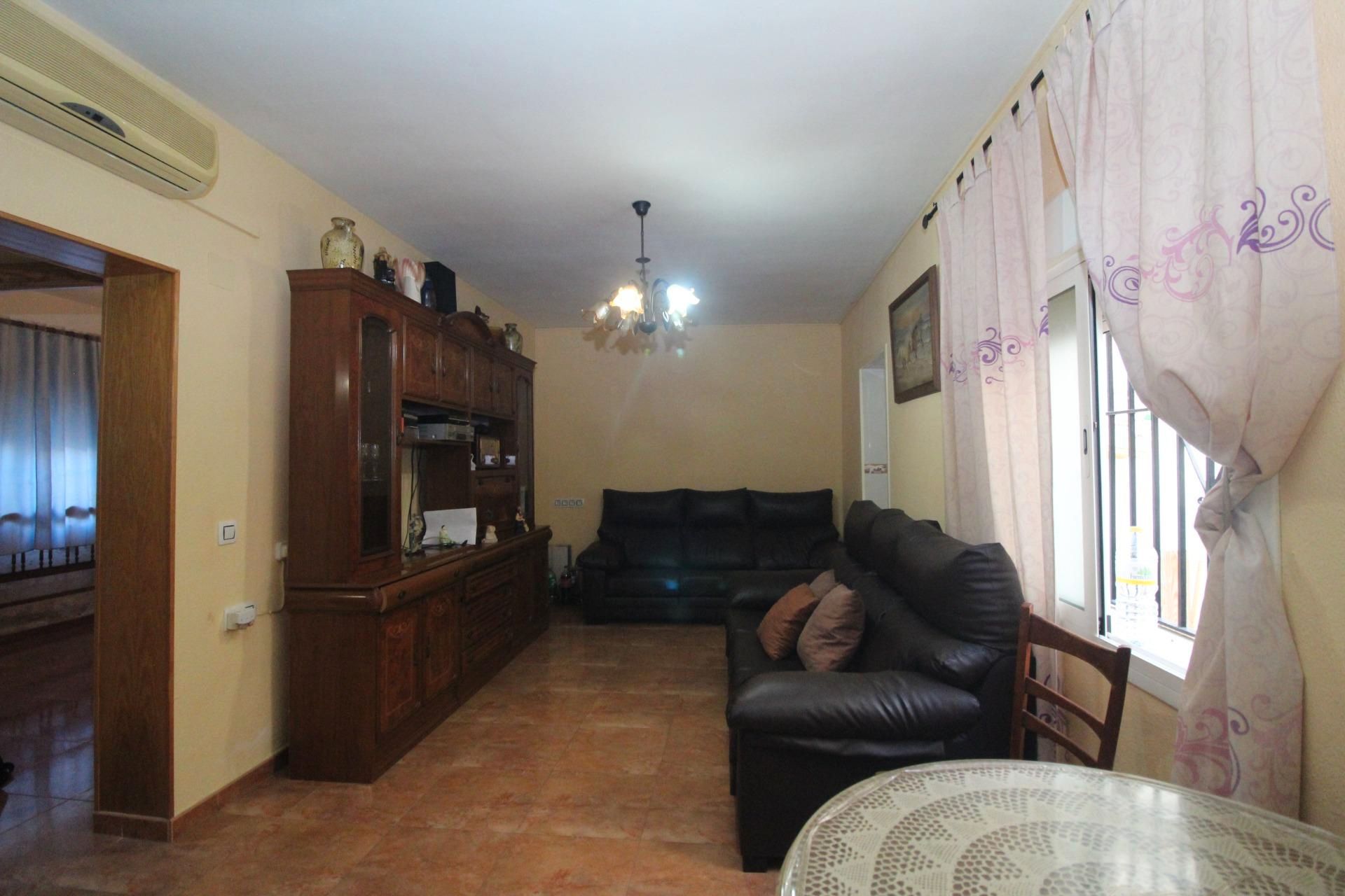 Sala d'estar de Casa adosada en venda en Málaga Capital amb Terrassa