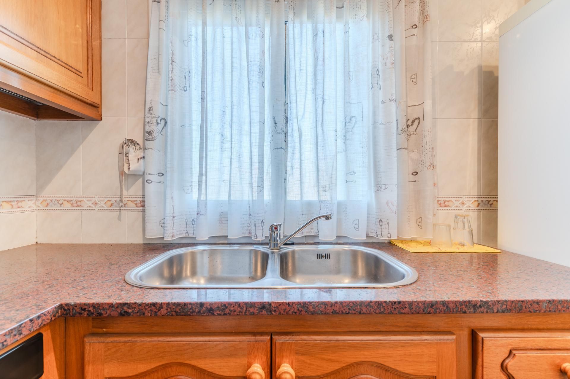 Cuina de Apartament en venda en Sarrià de Ter amb Calefacció