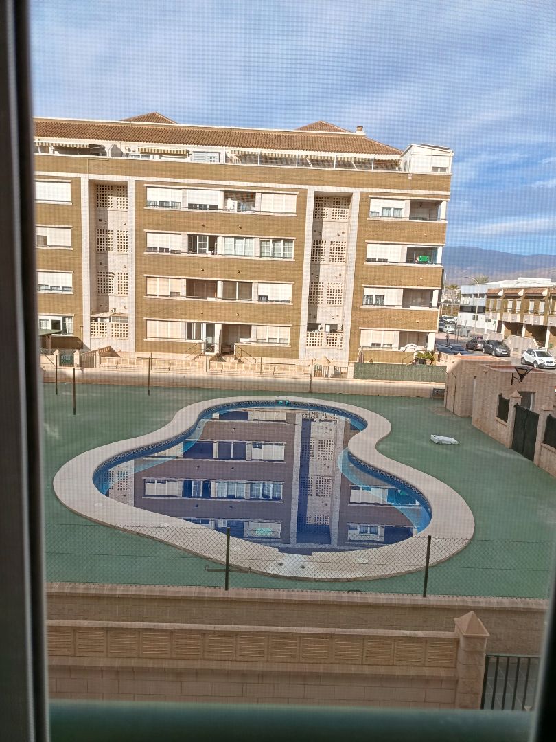 Swimming pool of Flat for sale in Roquetas de Mar  with Air Conditioner, Furnished and Alarm