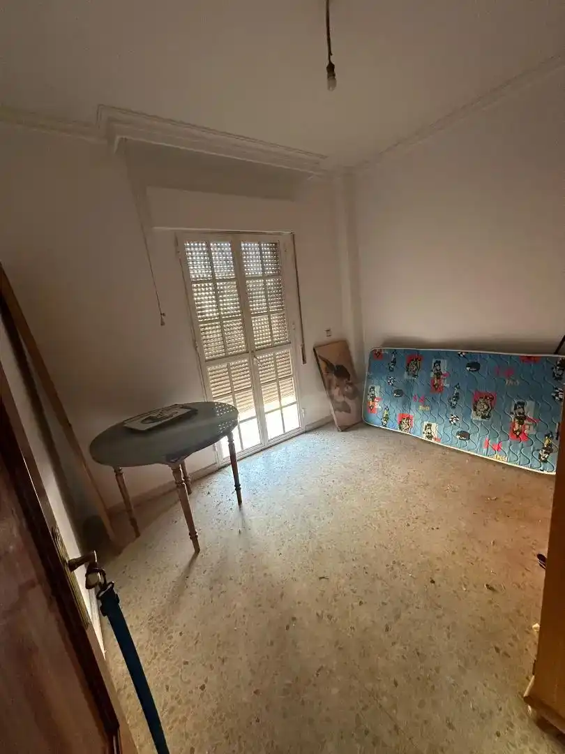 Dormitori de Casa adosada en venda en Dos Hermanas amb Aire condicionat