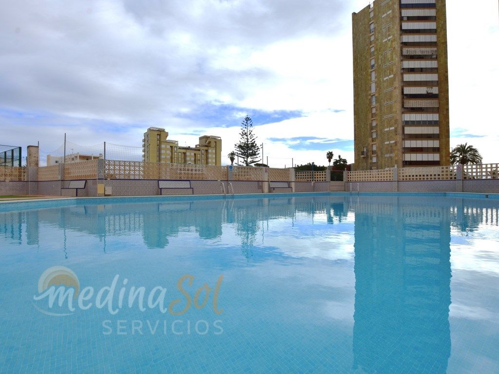 Piscina de Planta baixa en venda en La Manga del Mar Menor amb Jardí privat, Rentadora i Piscina comunitària