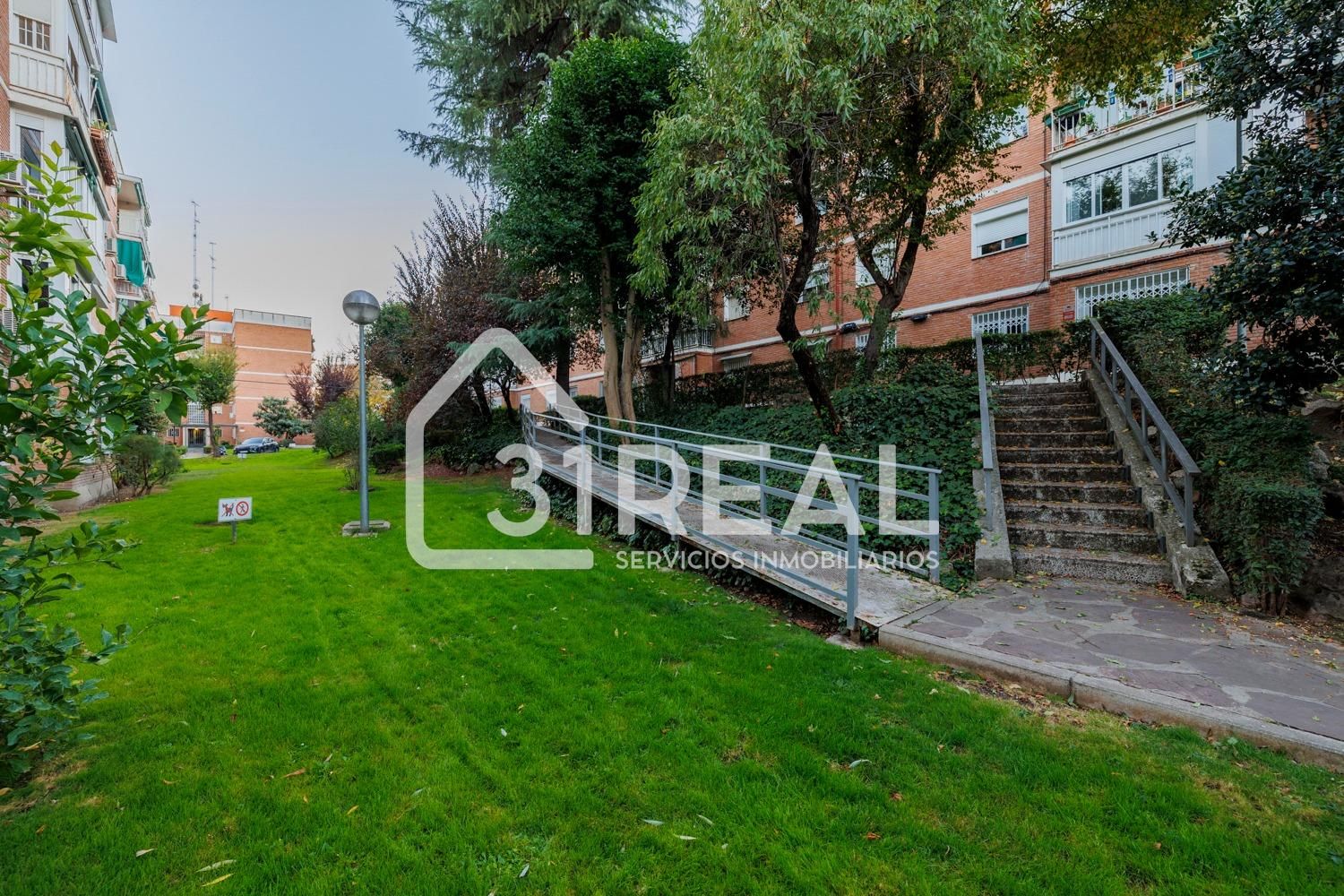 Exterior view of Flat for sale in  Madrid Capital  with Heating, Private garden and Parquet flooring