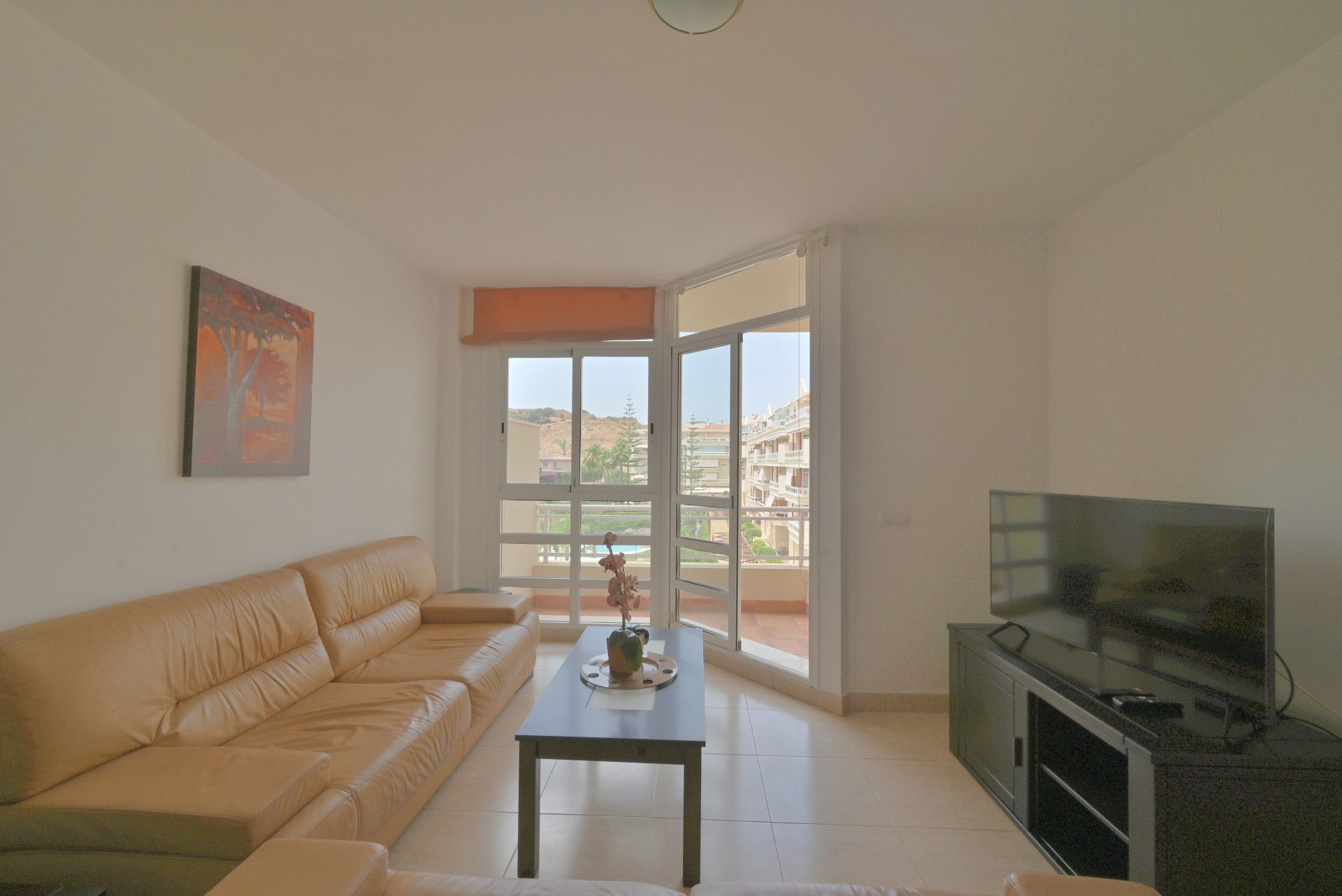 Sala d'estar de Apartament en venda en Mijas amb Aire condicionat, Terrassa i Moblat
