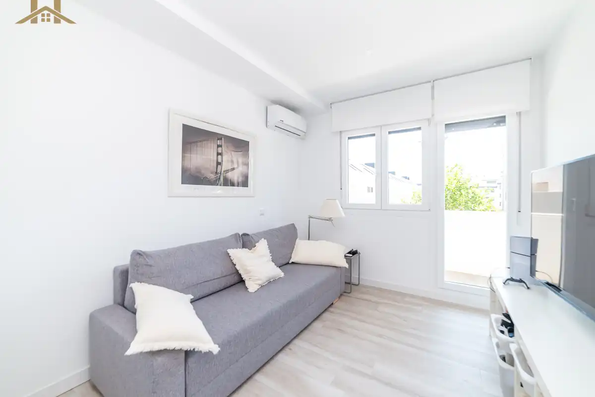 Sala d'estar de Casa adosada en venda en Villanueva del Pardillo amb Aire condicionat, Calefacció i Terrassa