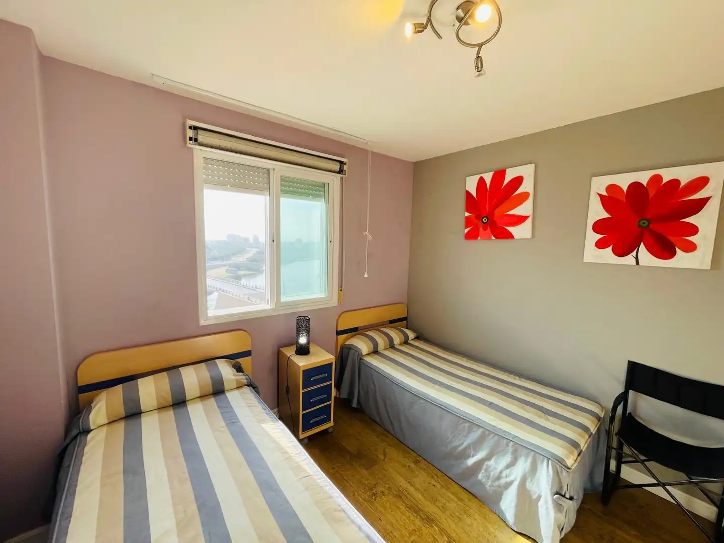 Habitación de Apartamento de alquiler en La Manga del Mar Menor con Aire acondicionado, Calefacción y Piscina