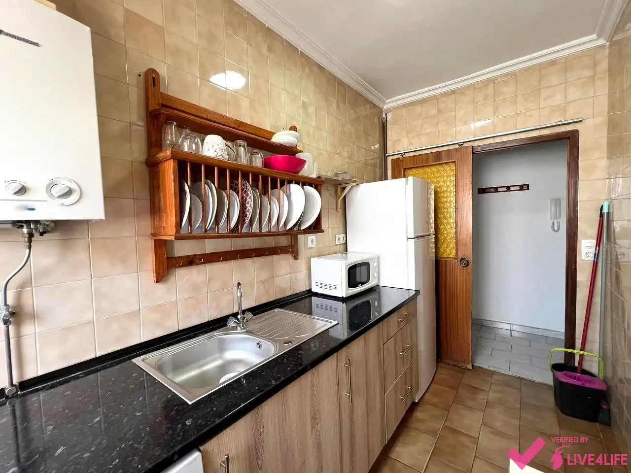 Kitchen of Flat for share in Sevilla  with Air Conditioner, Heating and Furnished