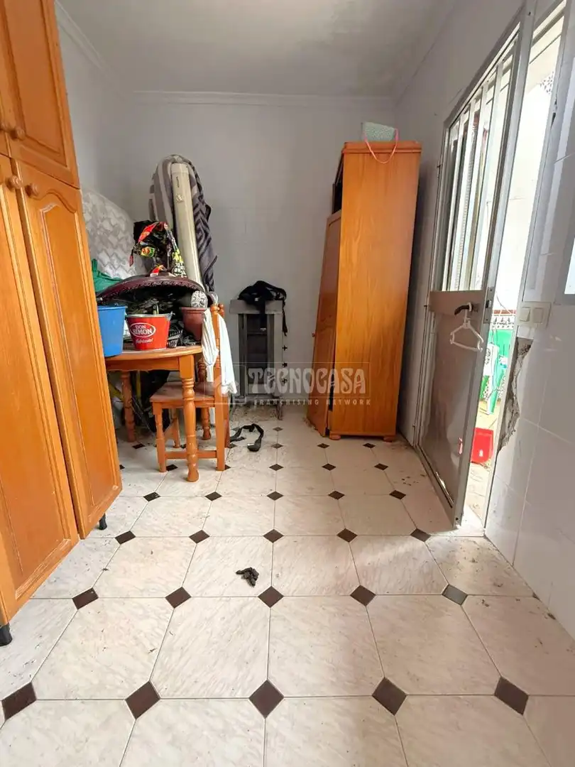 Dormitori de Casa adosada en venda en Málaga amb Jardí privat