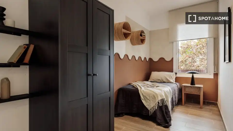 Dormitori de Apartament per a compartir en Barcelona amb Aire condicionat, Terrassa i Moblat