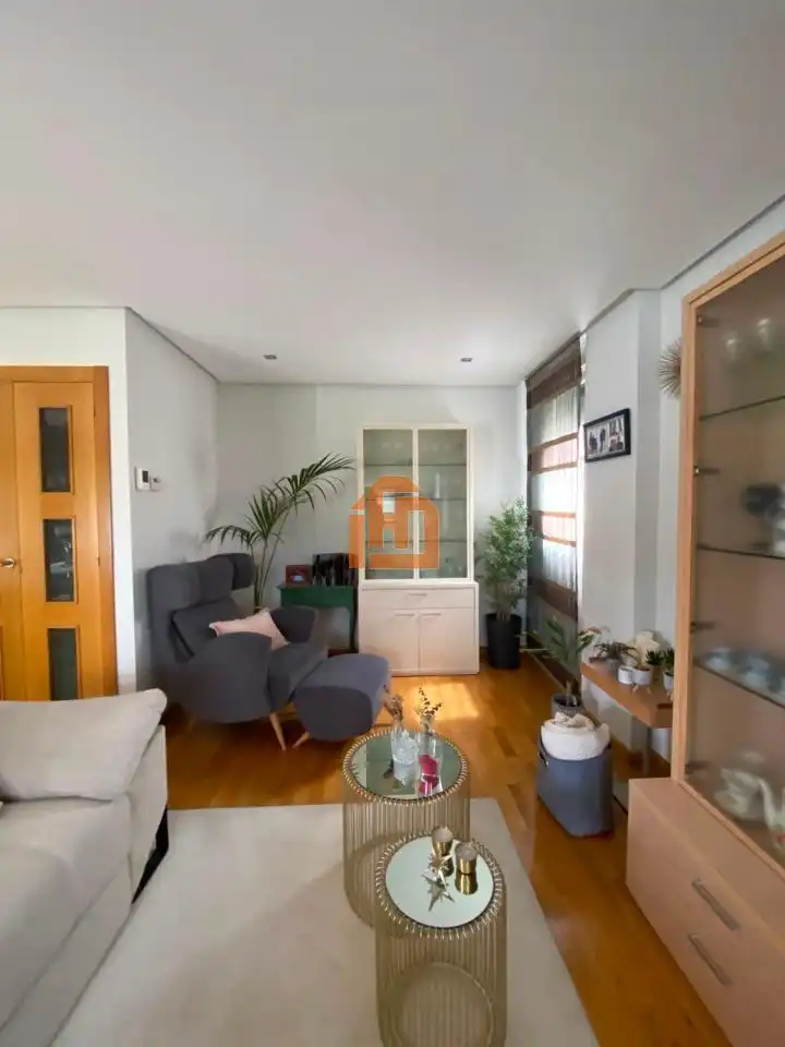 Sala de estar de Casa adosada en venta en San Andrés del Rabanedo con Calefacción, Jardín privado y Trastero