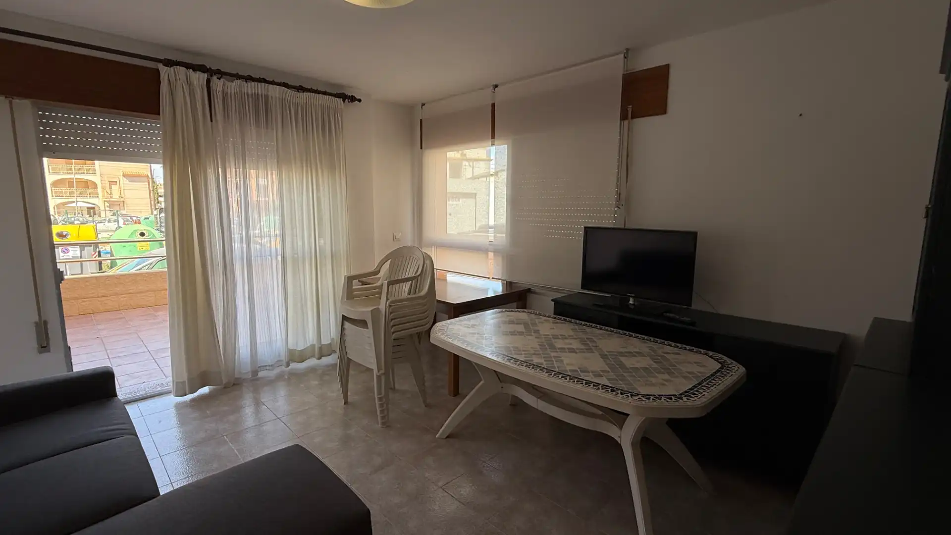 Sala de estar de Casa adosada en venta en Águilas con Jardín privado, Terraza y Trastero